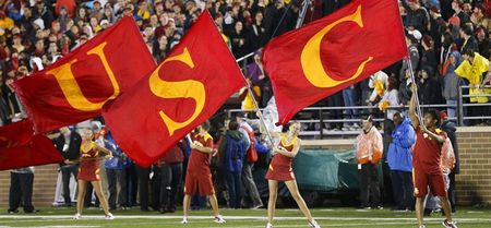 Vine: Cheerleader taken out by charging player, gets up before him