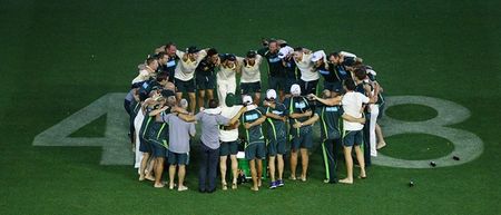 PICS: Aussies toast team-mate Philip Hughes after last-gasp Indian victory