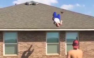 VIDEO: Backflip catch attempt off a roof goes very very badly