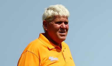 VINE: John Daly whacks four balls into Lake Michigan, his club follows, kid fishes it out