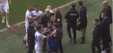 Leeds United’s Mateusz Klich squirts water down opponent’s back during melee